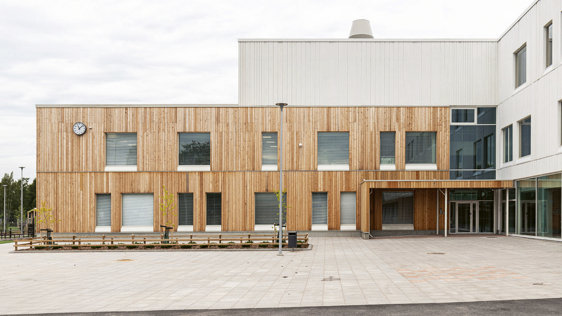 Concrete facade on school centre looks like wood